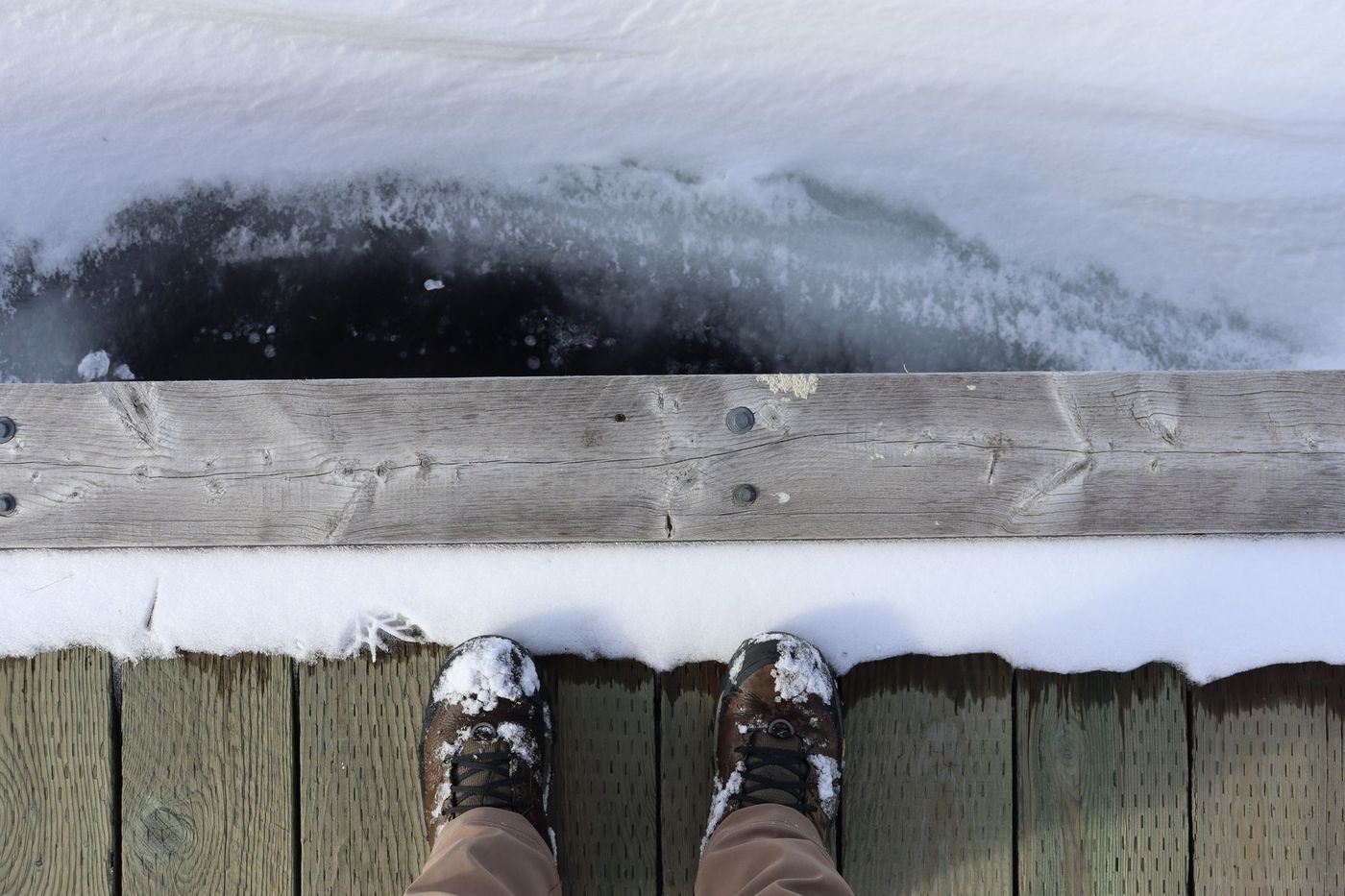Feet in snowy boots